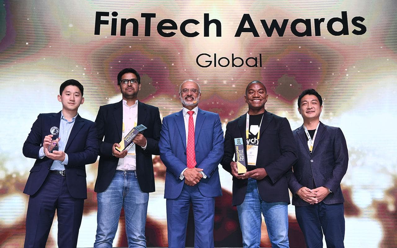 DBS CEO Pyush Gupta presents three companies, including Keychain, with the Global Fintech Award.